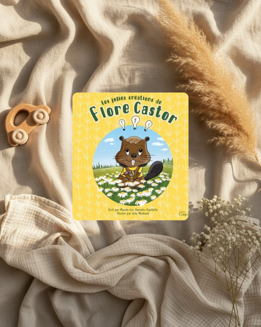 Livre jeunesse Flore Castor, couverture jaune avec dessin de castor et fleurs blanches