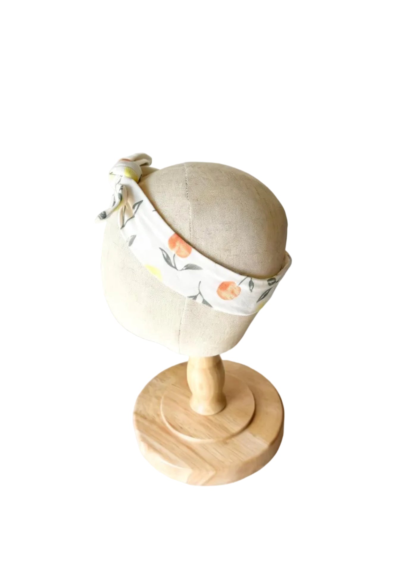 Bandeau bébé blanc beige avec bandeau élastique et nœud latéral, motif feuilles