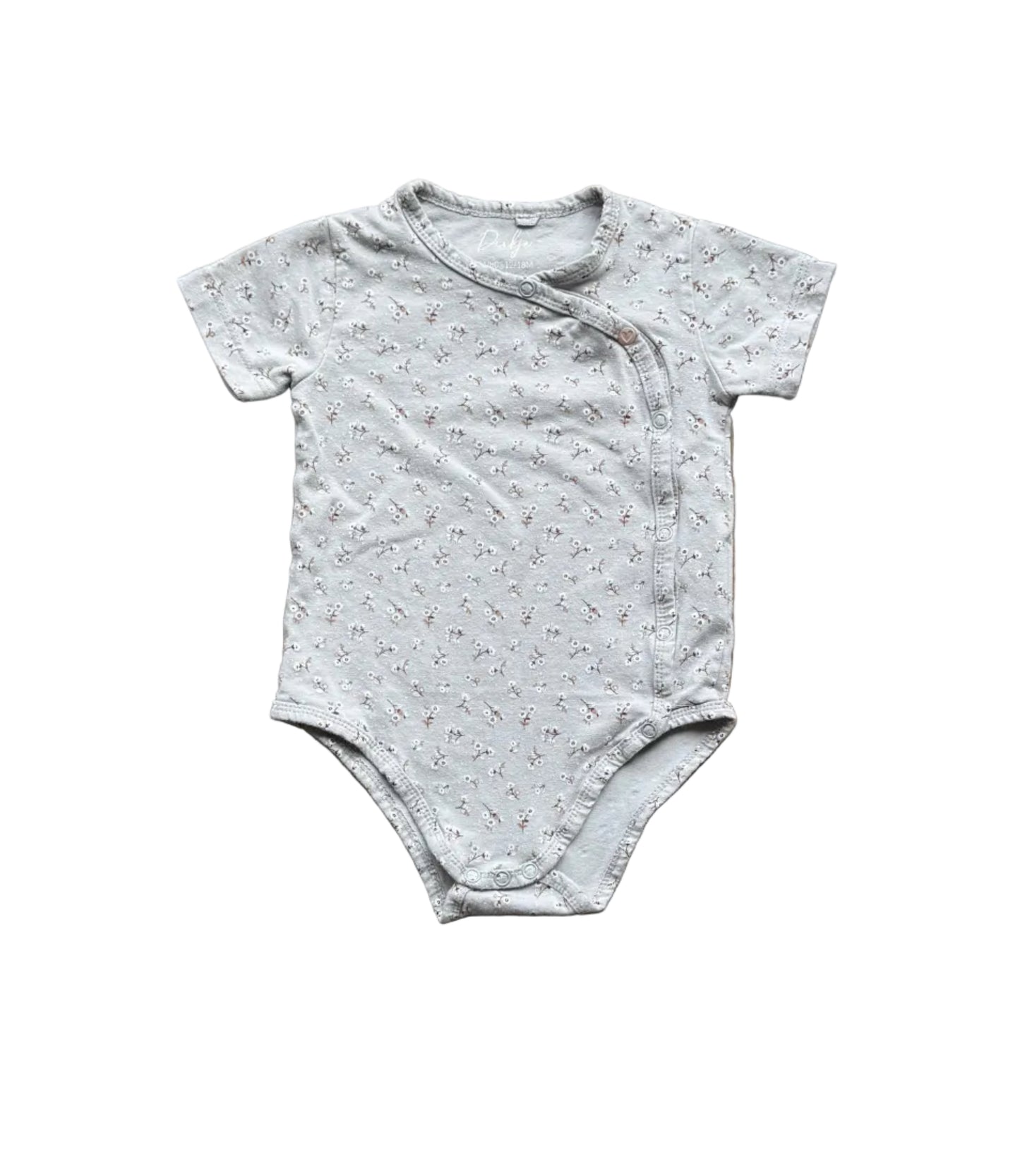 Body bébé manches courtes tissu clair à motifs fins, fermeture pression à l’avant.