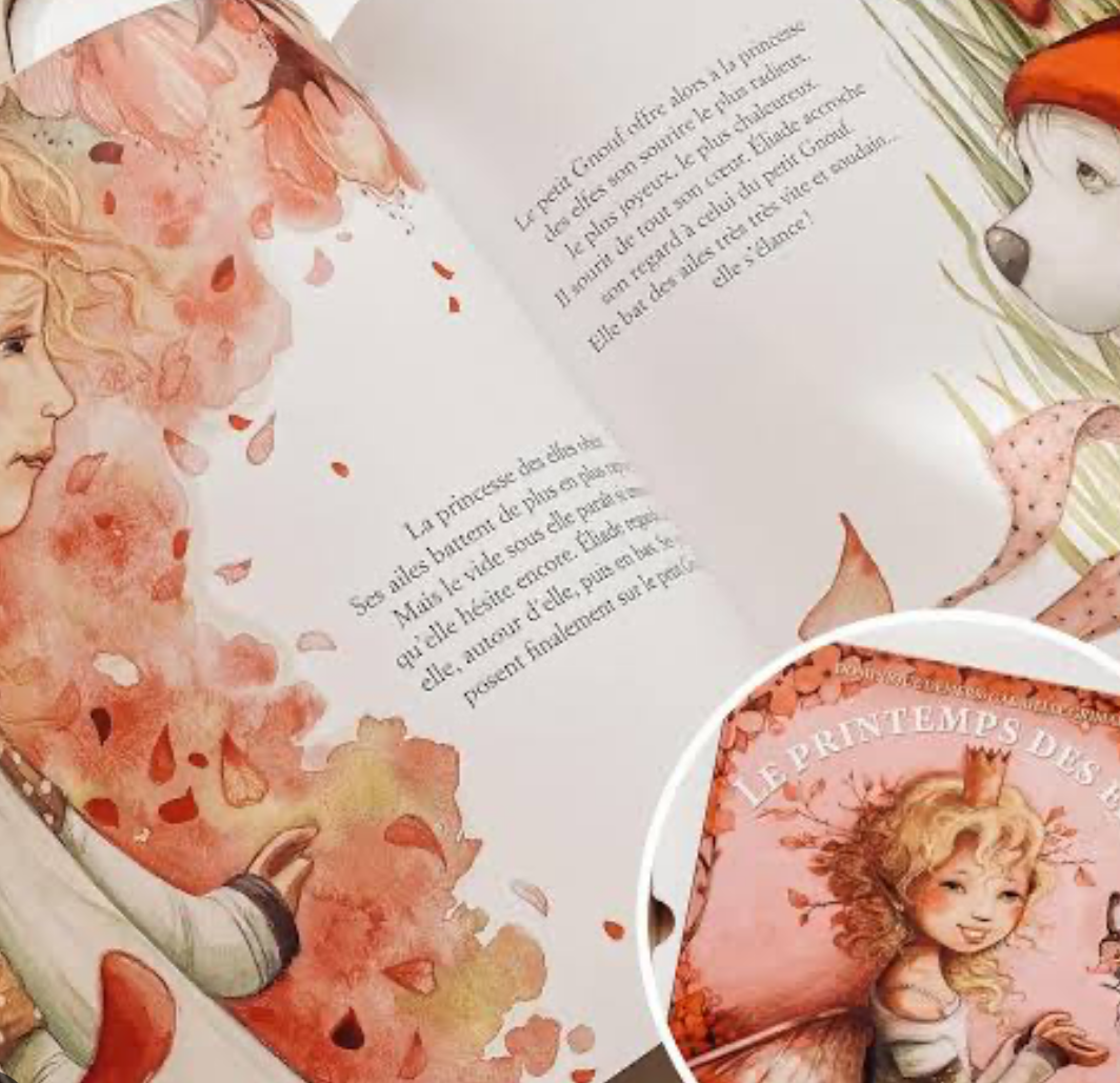 Livre ouvert : pages avec texte et illustrations de fleurs, fée et marges décorées