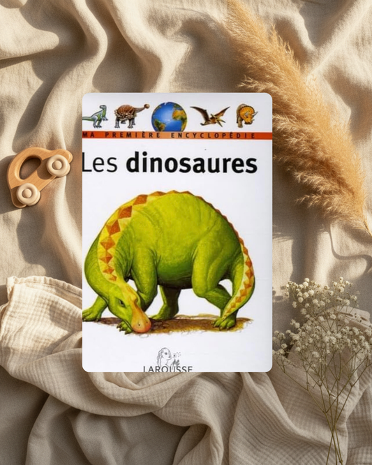 Livre encyclopédie jeunesse Larousse, couverture « Les dinosaures » avec grand dinosaure vert