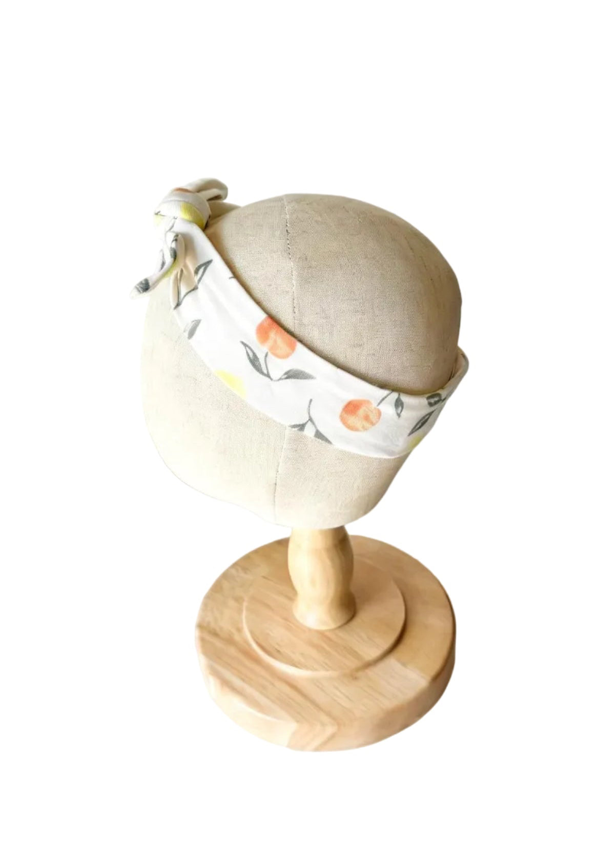 Bandeau bébé beige avec bande imprimée fruits et nœud sur le côté