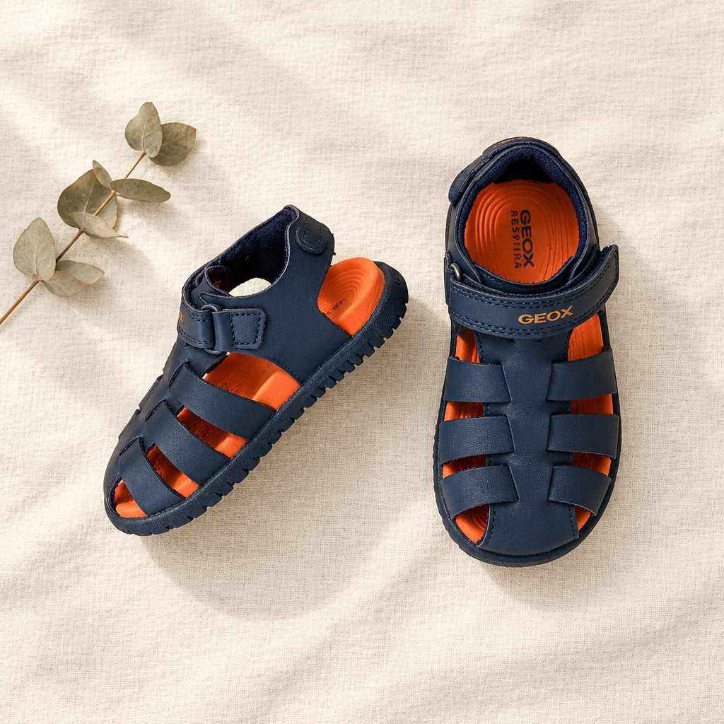 Sandales Geox marine pour enfant, brides croisées et velcro, détails orange, pointure 23.