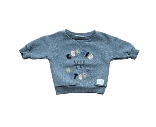 Chandail bébé gris bleuté à motif pattes, manches longues, col rond
