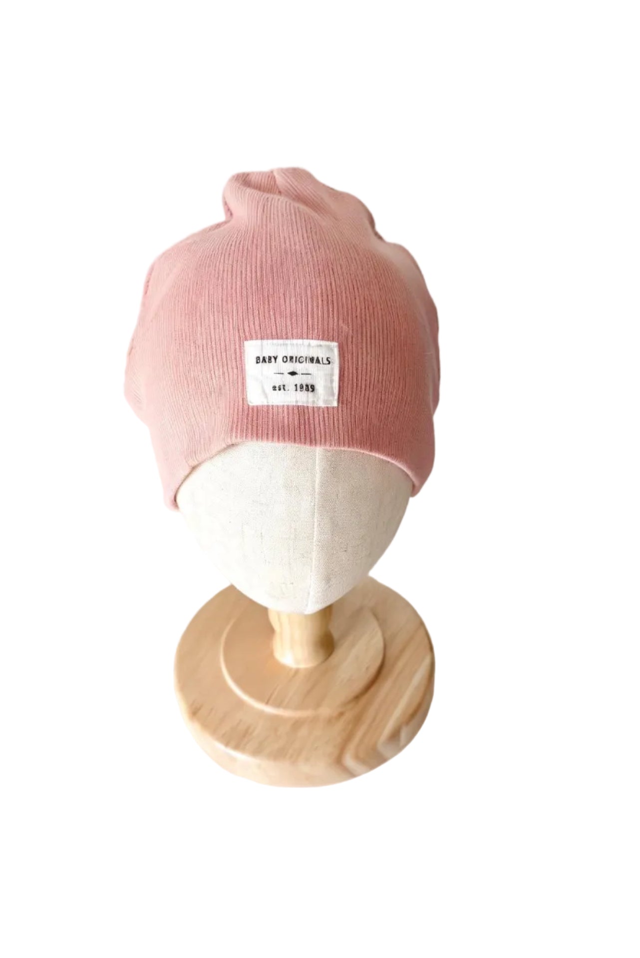 Bonnet H&M bébé rose 18-24 mois, en maille côtelée avec étiquette frontale.