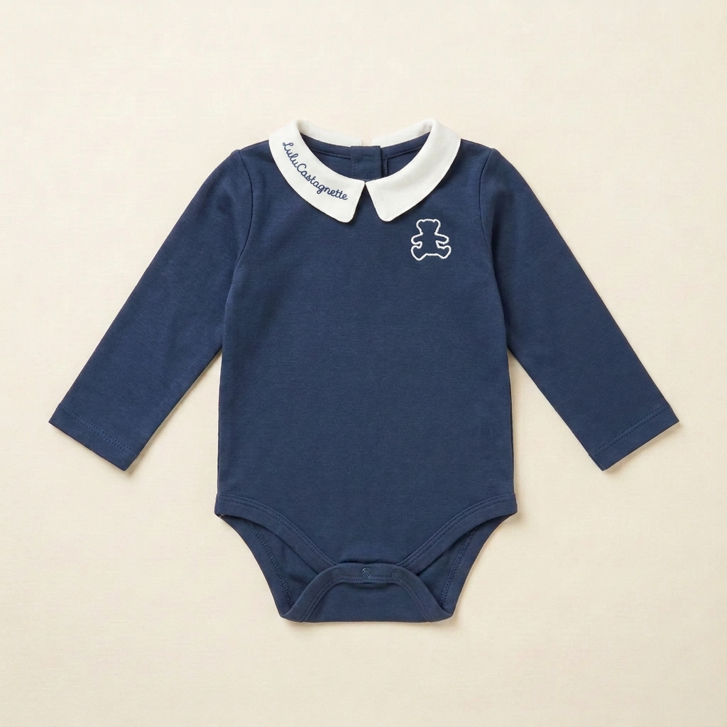 Body bébé manches longues bleu marine, col blanc contrasté, motif marin à l’avant, 9 mois