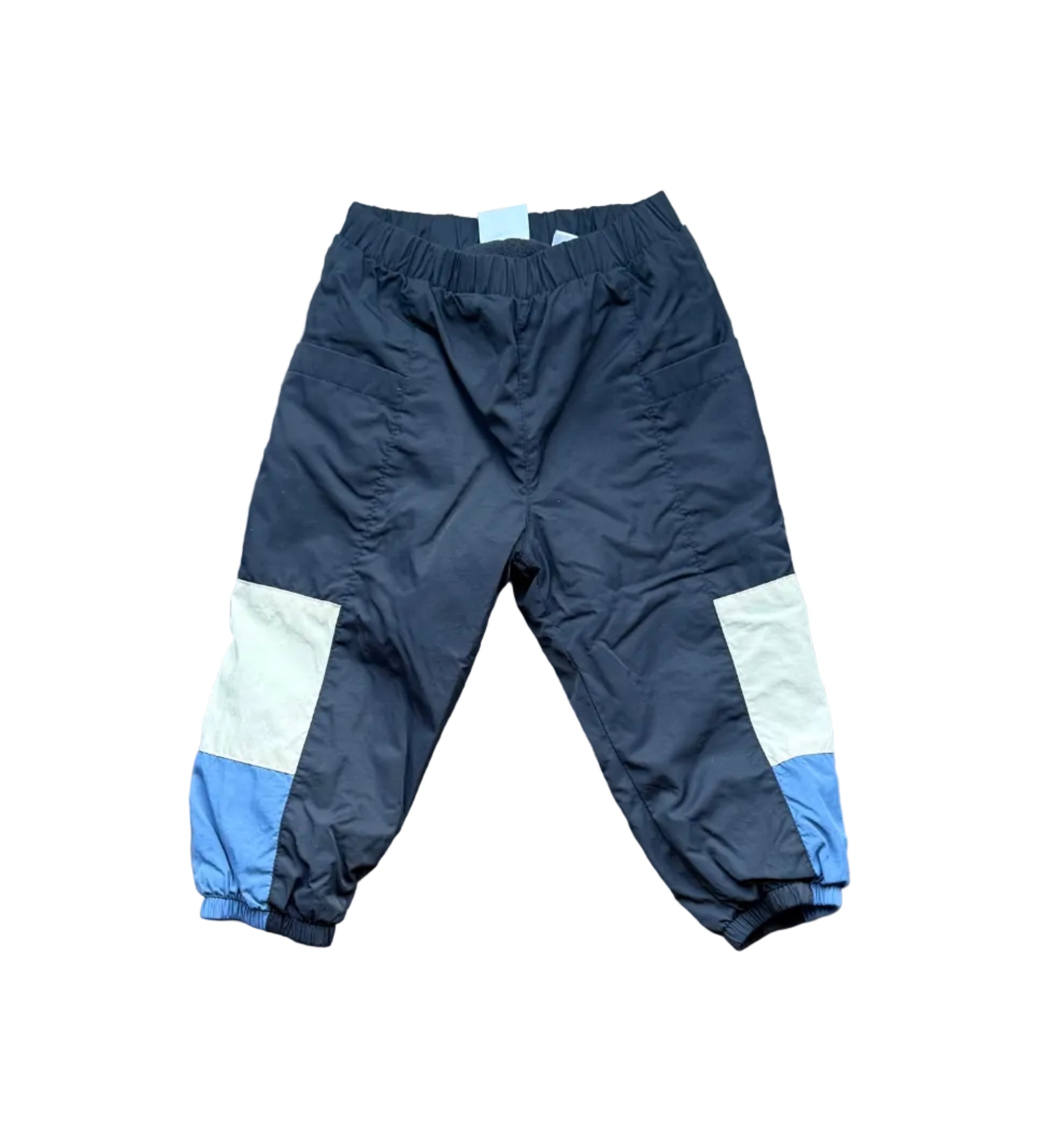 Pantalon Zara pour bébé, taille élastique, bleu foncé avec empiècements bleu clair.