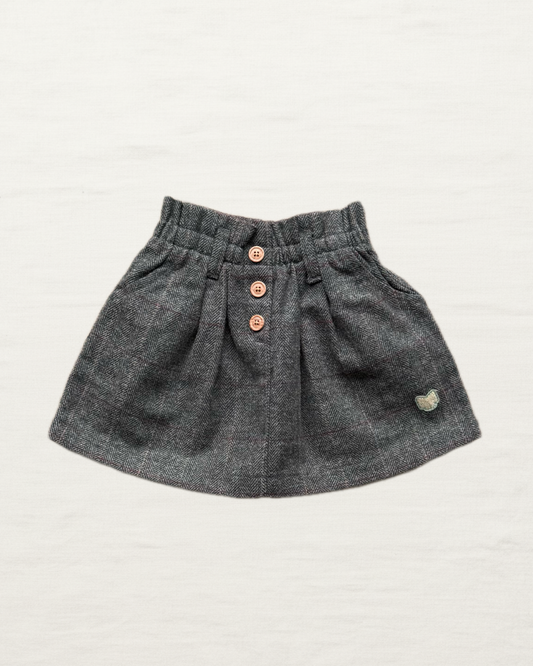 Jupe enfant à carreaux gris, taille élastique, boutons devant et écusson souris.