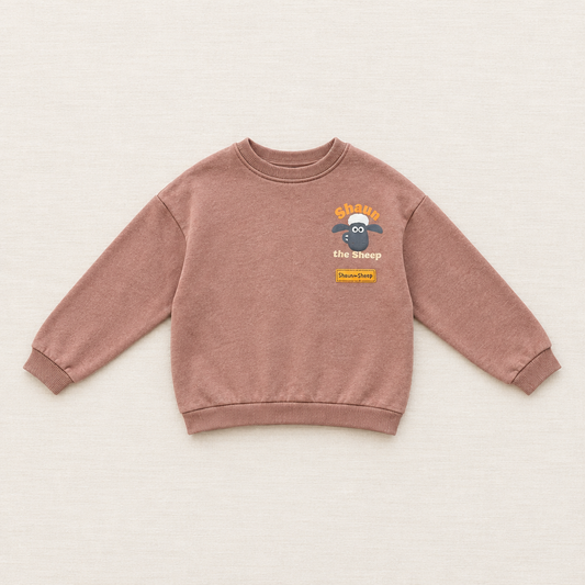 Chandail enfant rose à motif de mouton Shawn et texte « shawn the sheep »