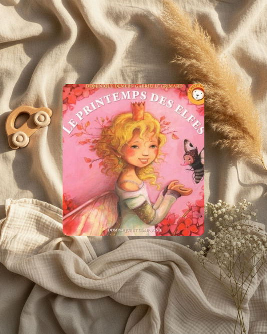 Livre jeunesse couverture rose avec elfe aux cheveux dorés et fleurs