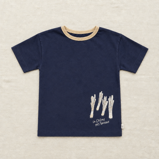 T-shirt enfant bleu marine, col beige et motif crème au bas