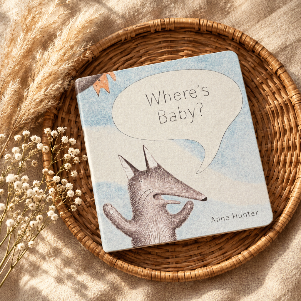 Livre jeunesse à couverture bleue, animal gris et bulle « Where’s Baby? »