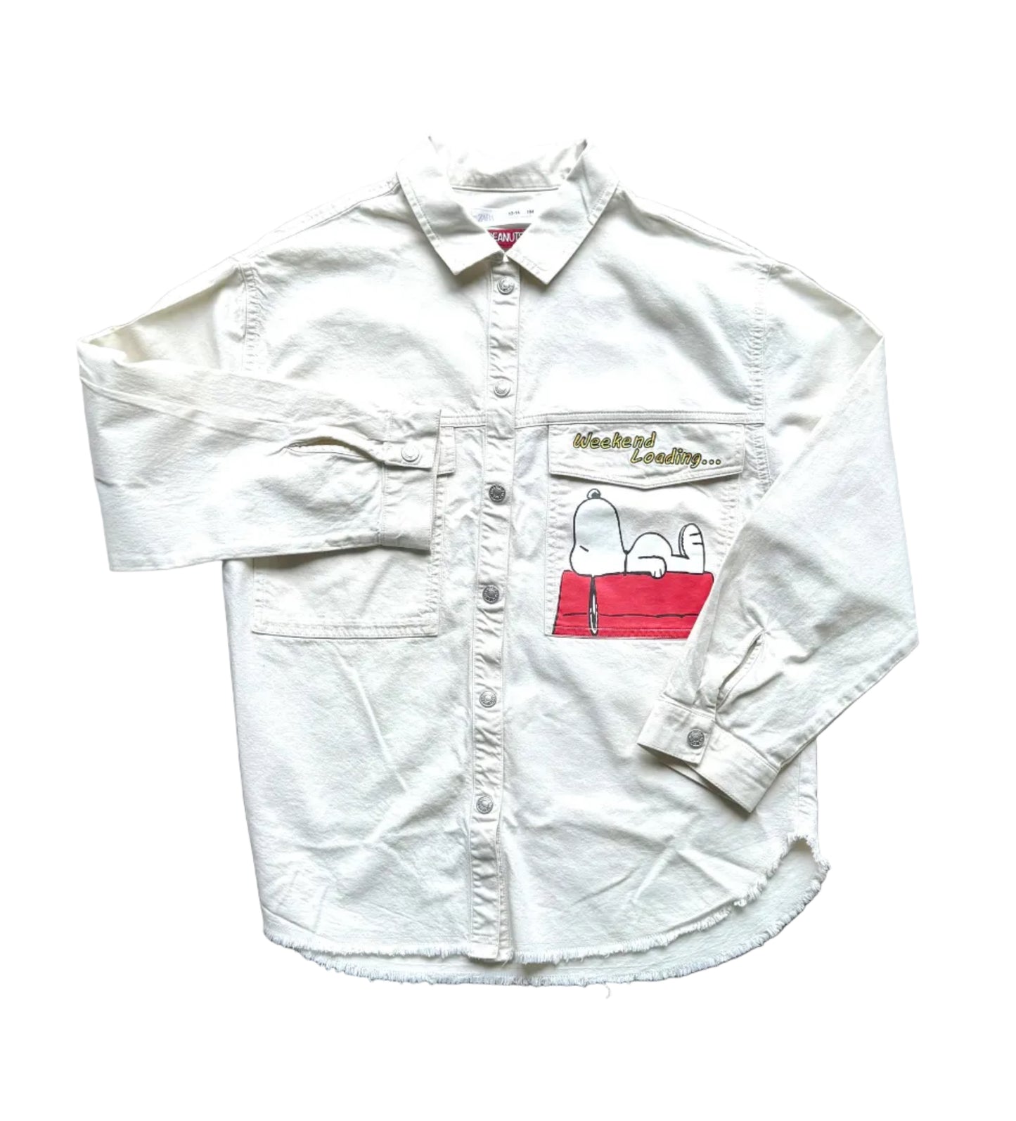 Chemise enfant blanche à manches longues, poche poitrine et motif Peanuts