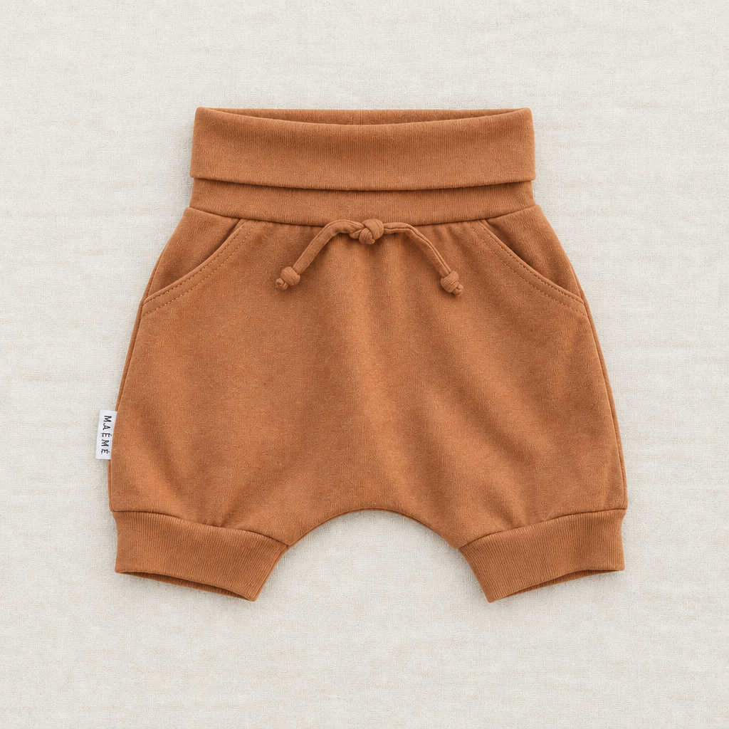 Short bébé Maémé marron, taille élastique avec cordon et pompons
