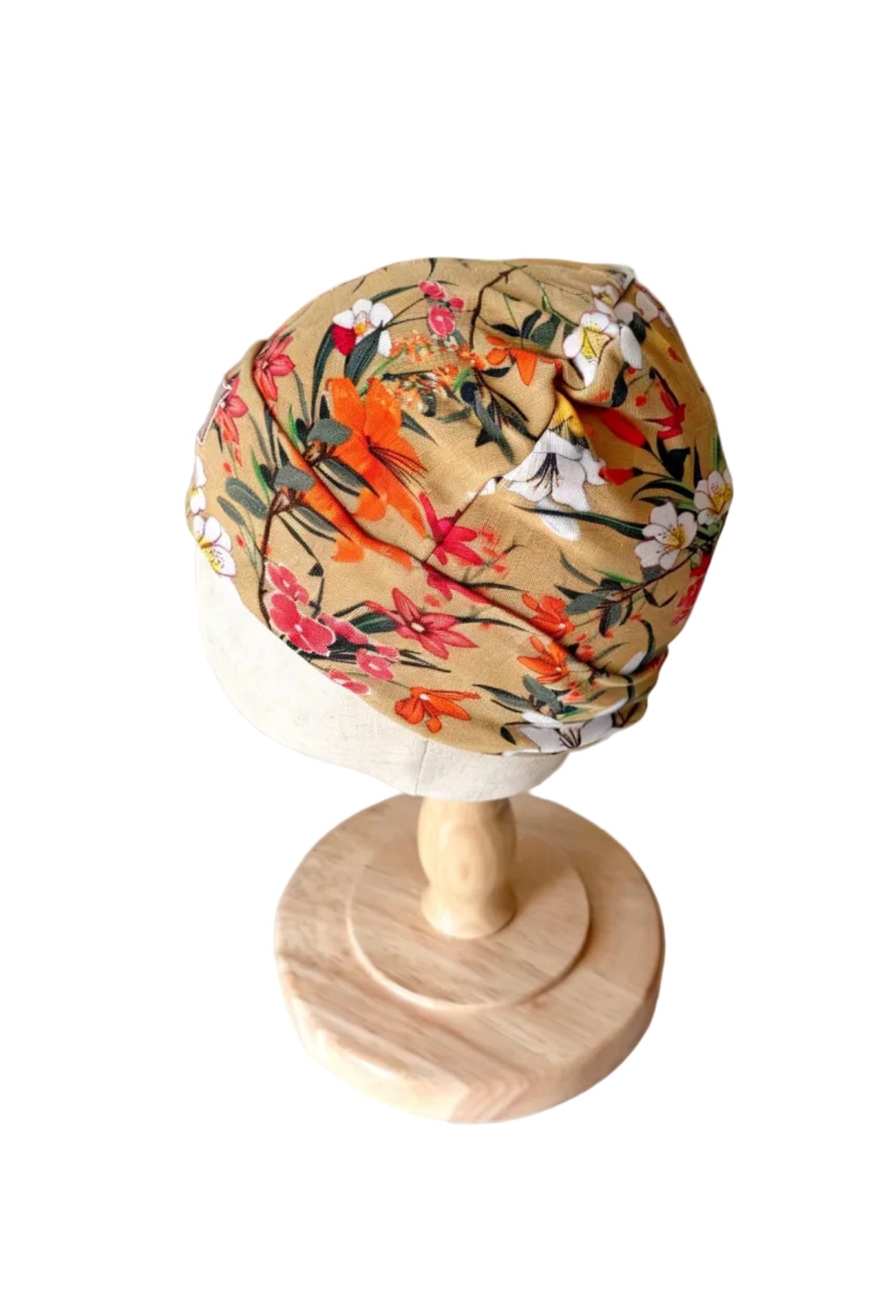 Bonnet bébé floral multicolore, revers et couture en cercle, vue de côté