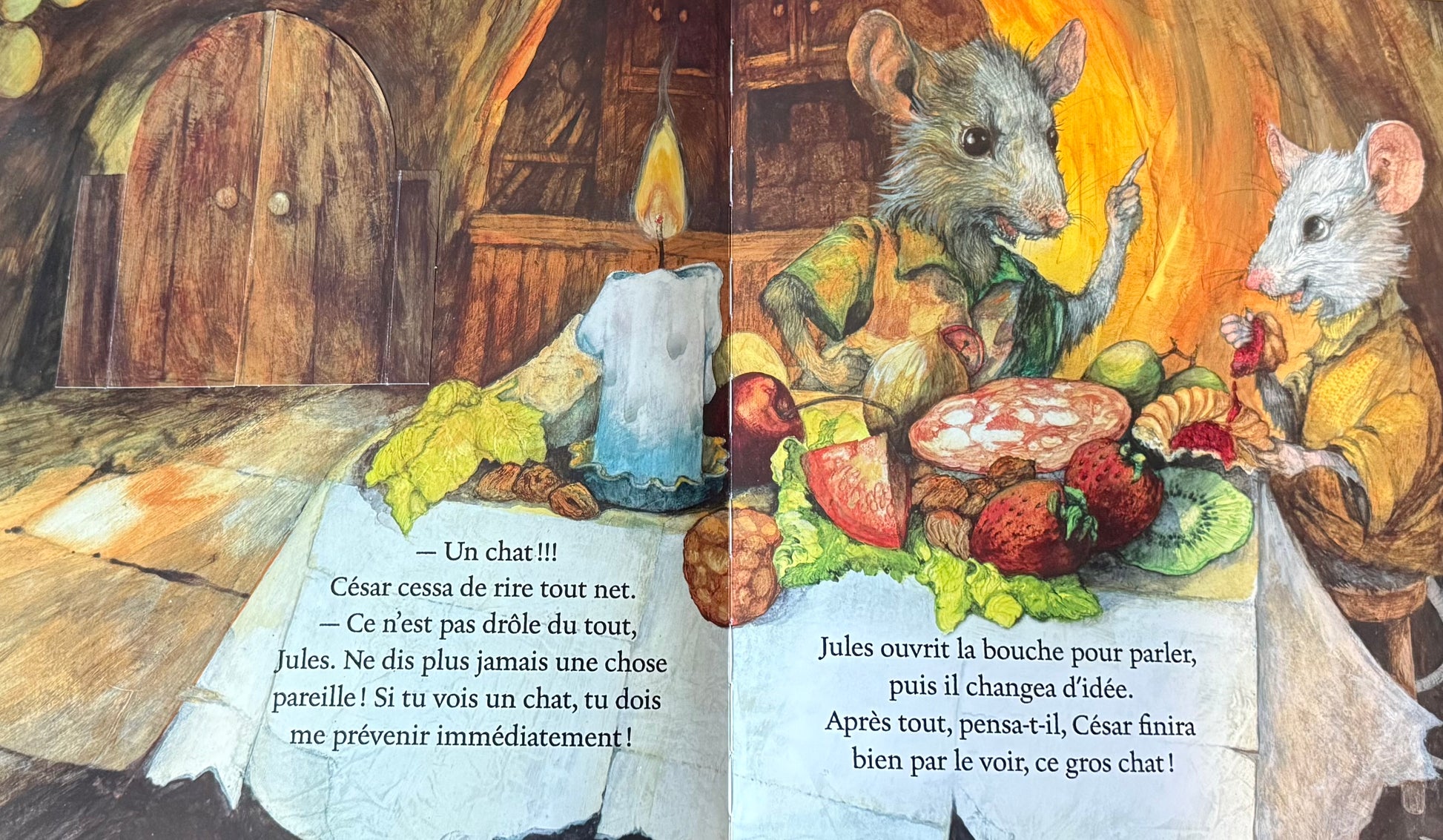 Livre 3D, page intérieure : deux souris devant une table, bougie allumée et texte