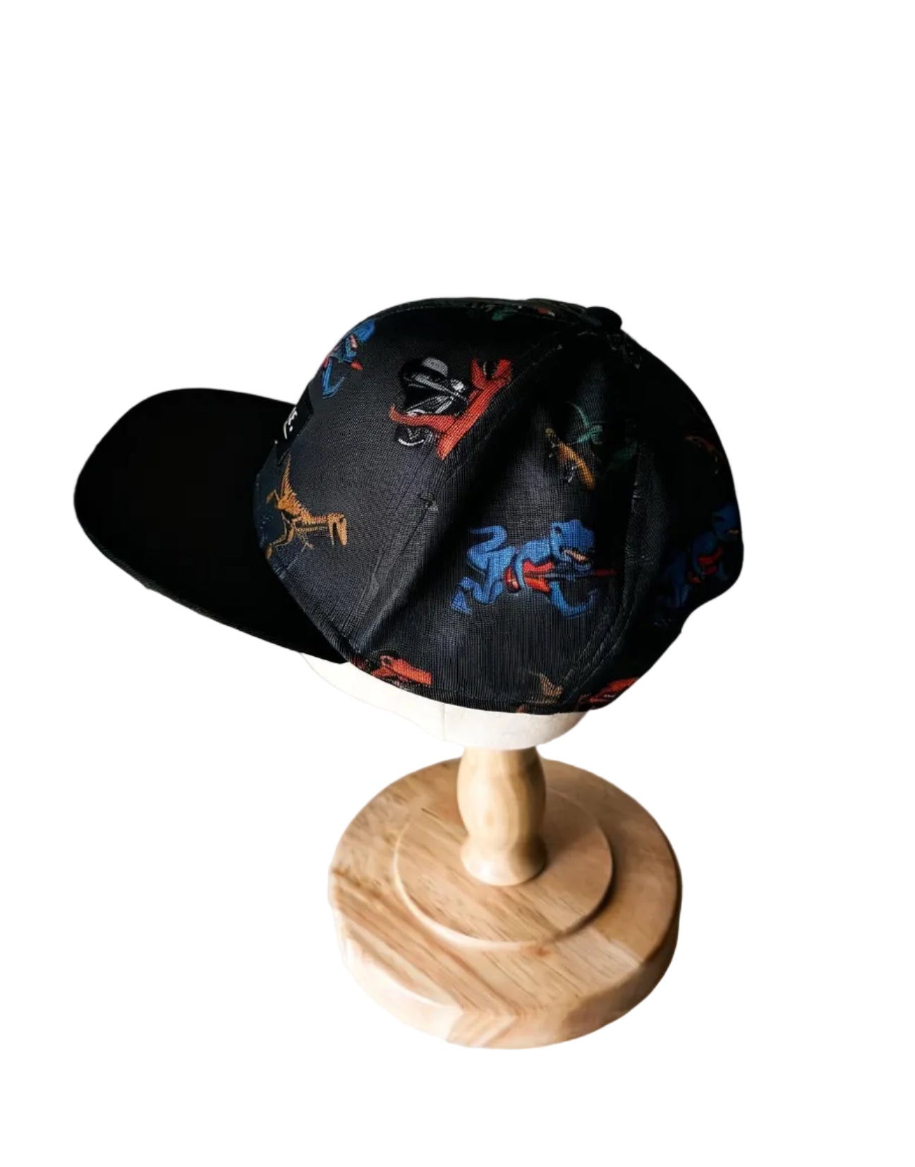 Casquette enfant noire KOVE, motif dinosaures sur le côté, visière courbée
