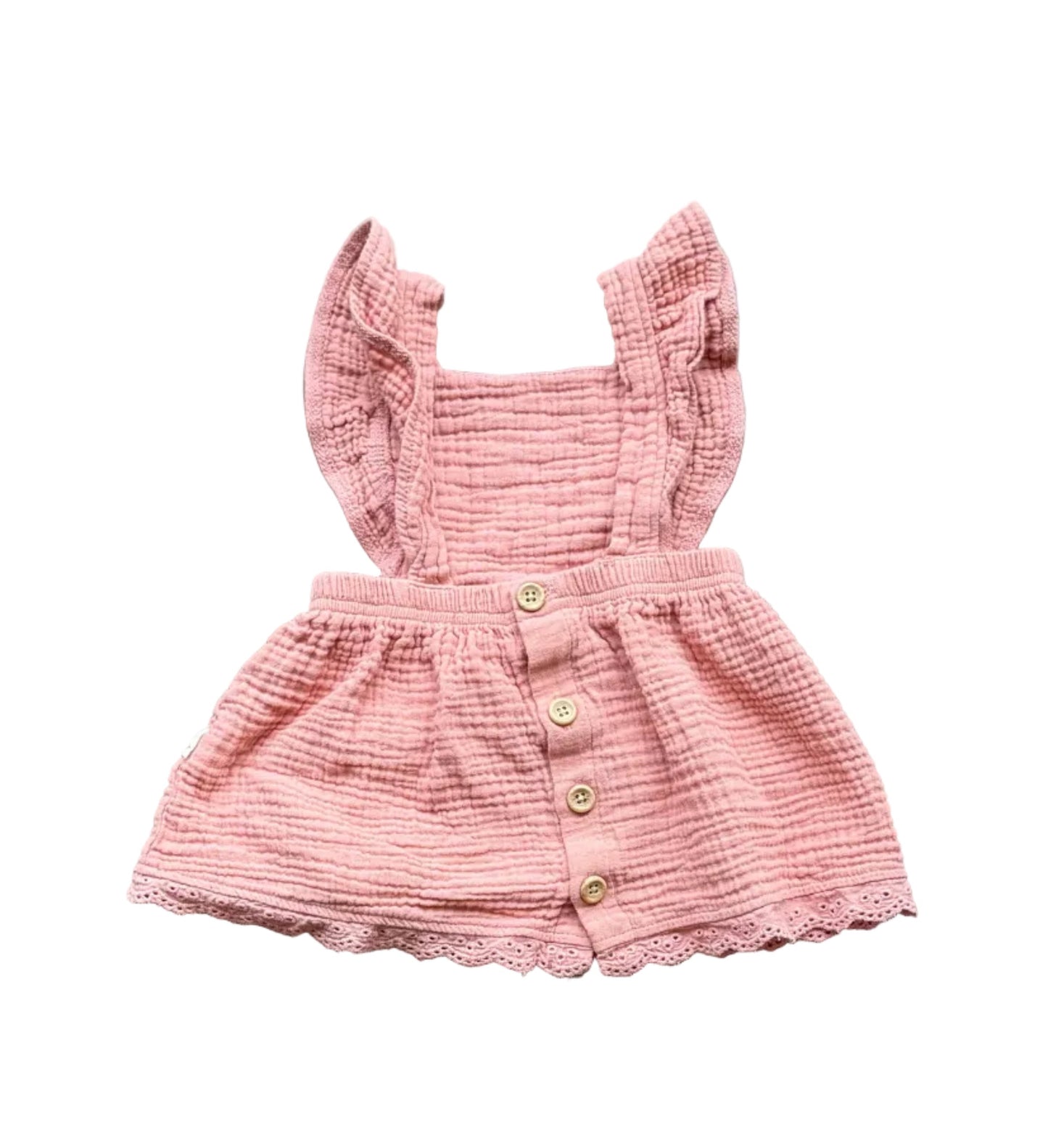 Robe bébé rose crème avec haut froncé, boutons devant et jupe évasée ajourée