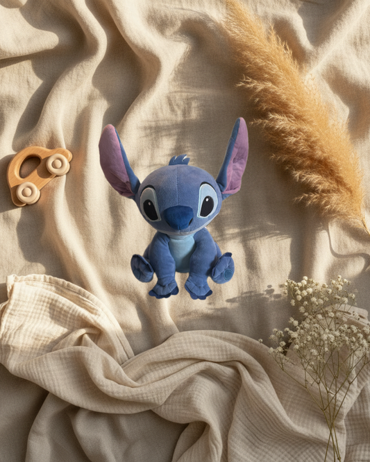 Peluche Stitch Disney bleue, oreilles pointues, assise