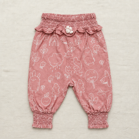 Pantalon bébé rose rosé à motifs animaux, ceinture élastique et bas côtelés.