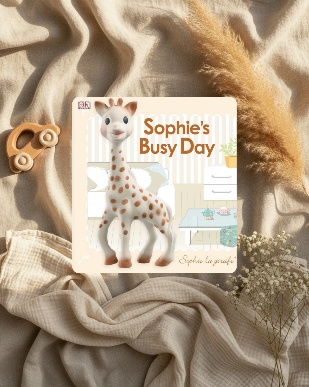 Livre jeunesse, couverture avec girafe Sophie et texte coloré