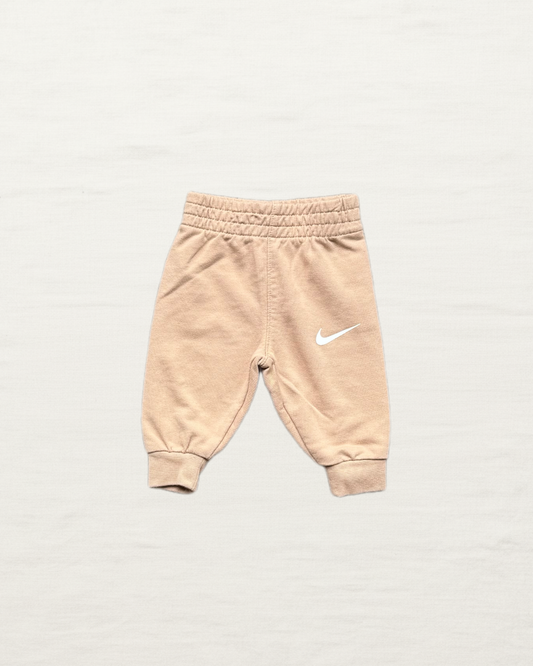 Pantalon Nike Nb beige avec taille élastique et logo Swoosh, bas côtelé