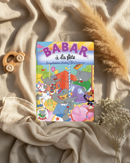 Livre jeunesse Babar «À la fête» couverture illustrée multicolore