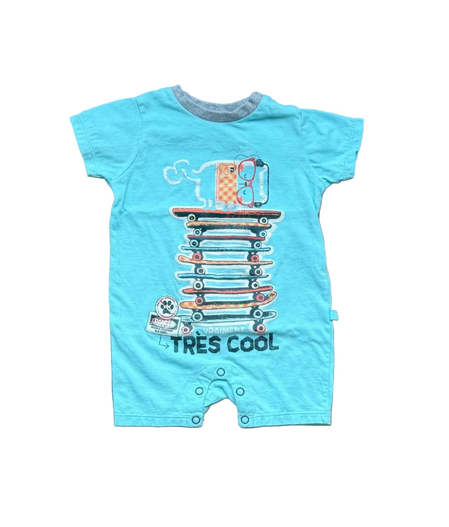 Une-pièce bébé 12 mois turquoise, imprimé “Très cool” et pile de livres
