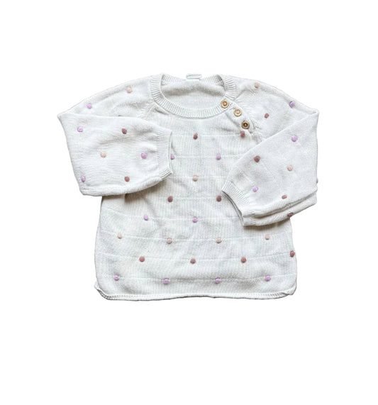 Chandail enfant ivoire à pois multicolores, manches longues, encolure boutonnée.