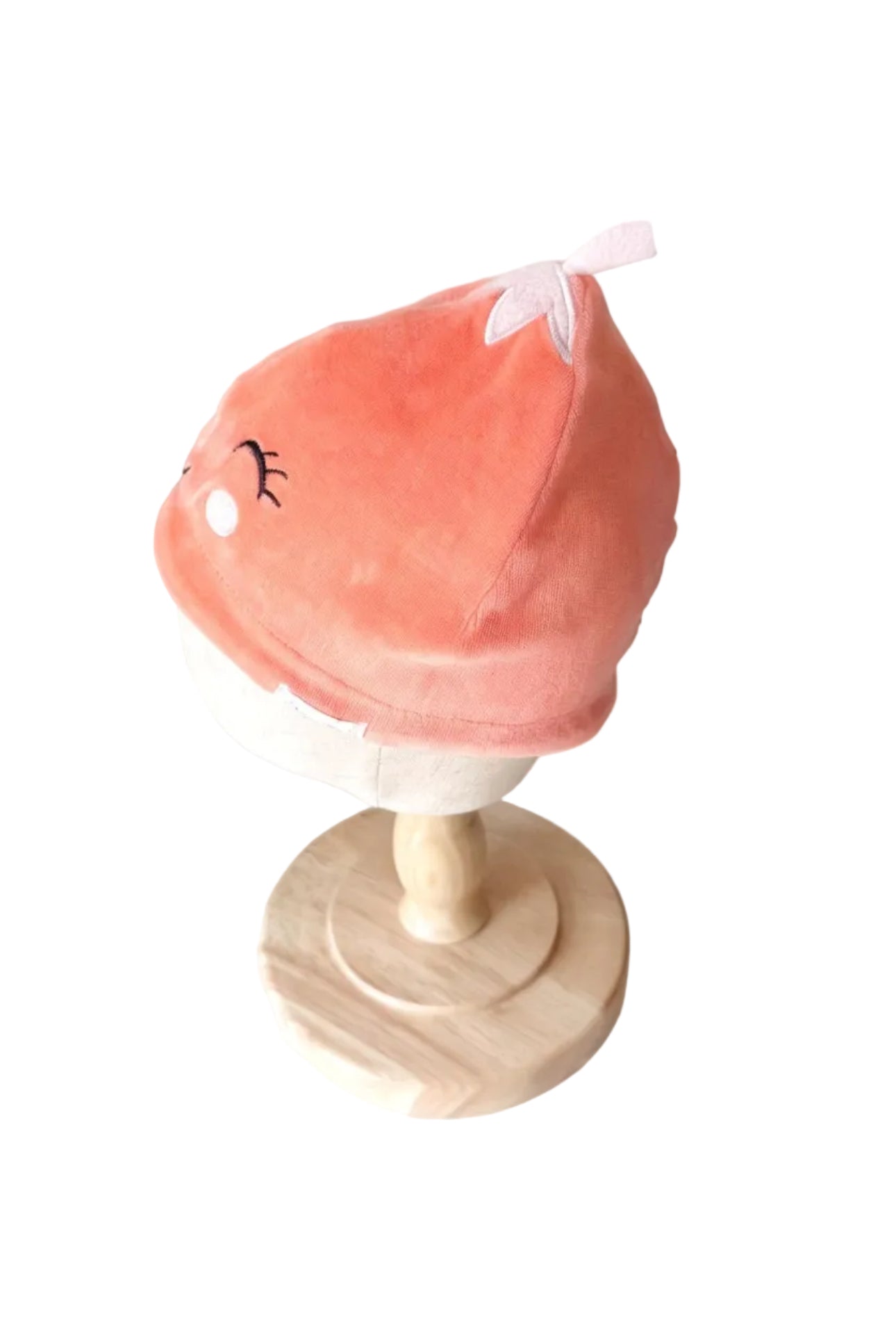 Bonnet rose à visage brodé, vue de côté