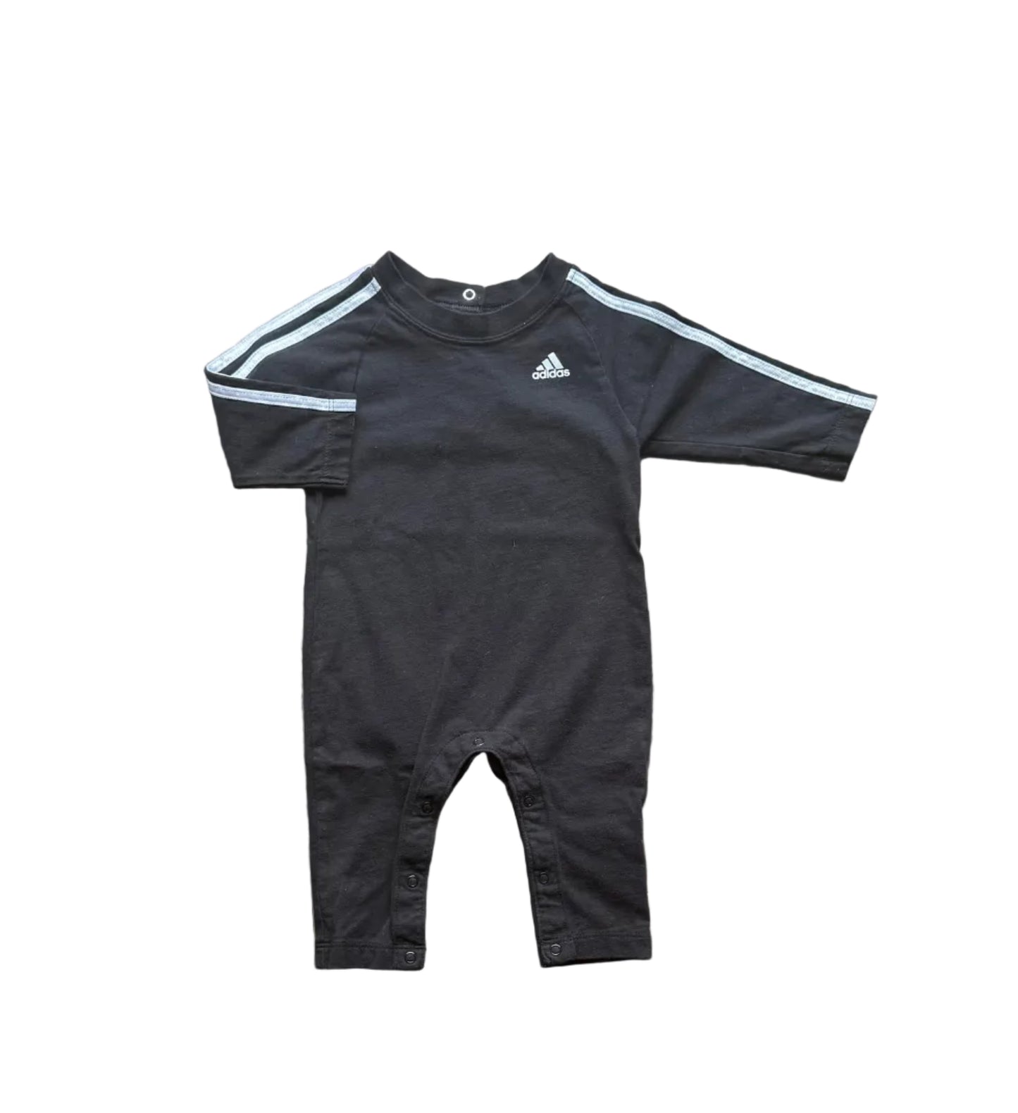 Combinaison bébé Adidas noire manches longues, rayures latérales, encolure ronde.