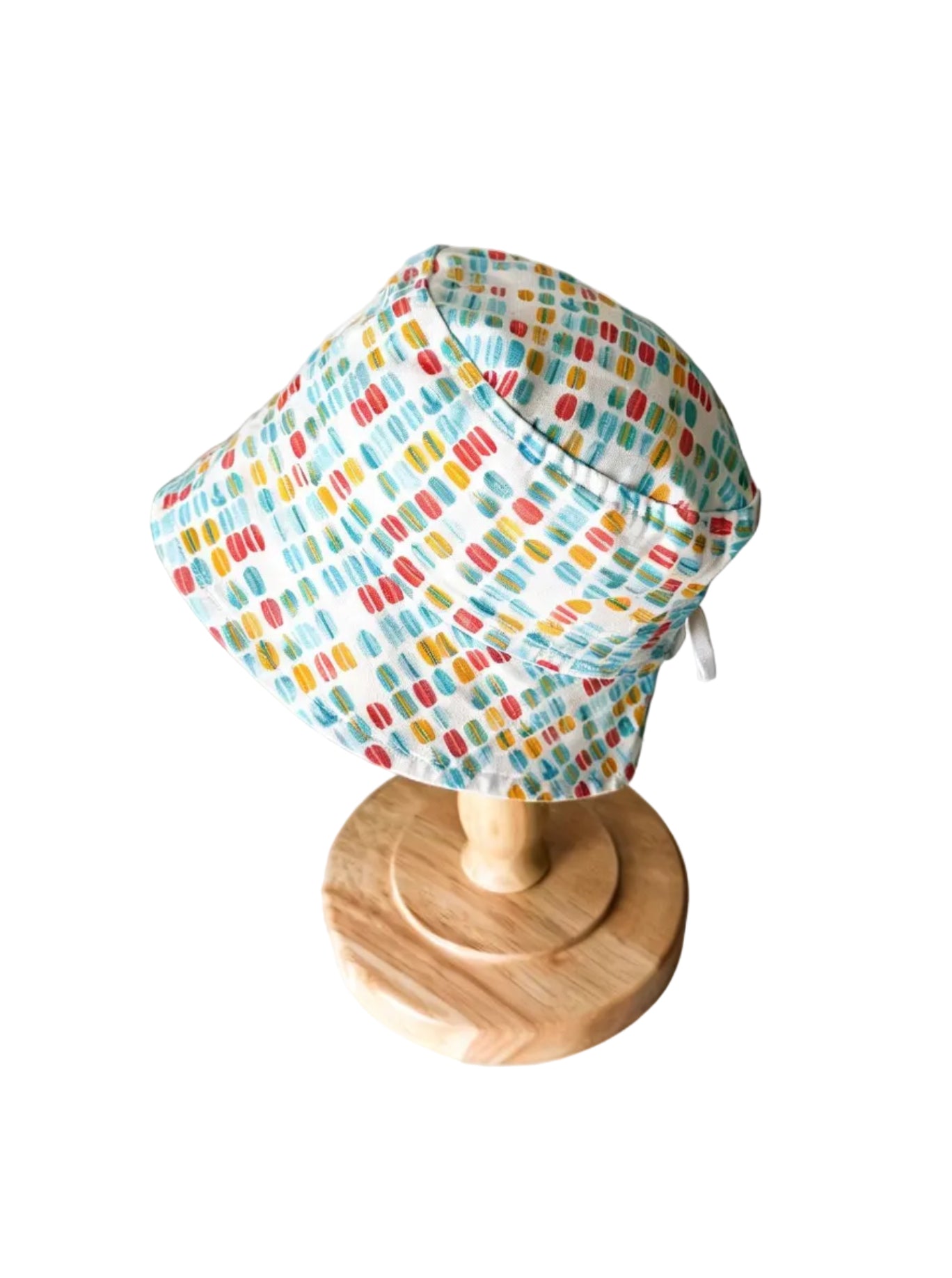 Chapeau bébé trigolo à motifs géométriques multicolores, nœud sur le côté