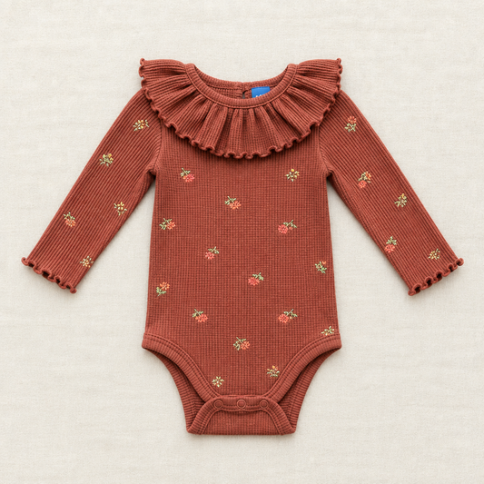 Body bébé rouille à volants, manches longues, motifs floraux, fermeture pression