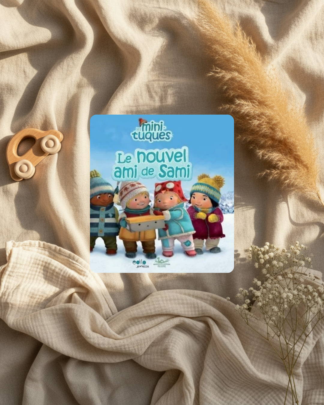 Livre jeunesse Mini tuques, couverture bleue avec enfants en tuques et titre « Le nouvel ami »