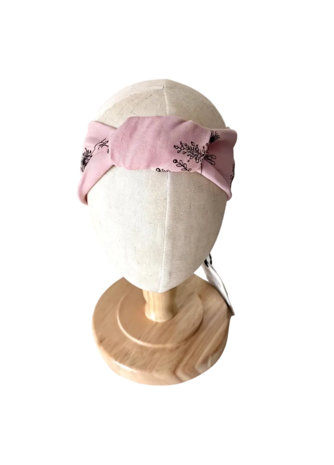Bandeau bébé Deux par Deux rose avec broderies florales noires et nœud noué