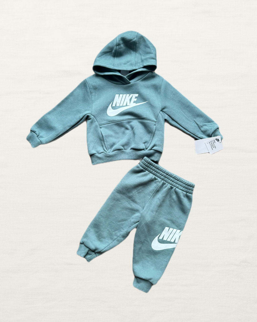 Ensemble bébé Nike bleu sarcelle : sweat à capuche et pantalon avec logo