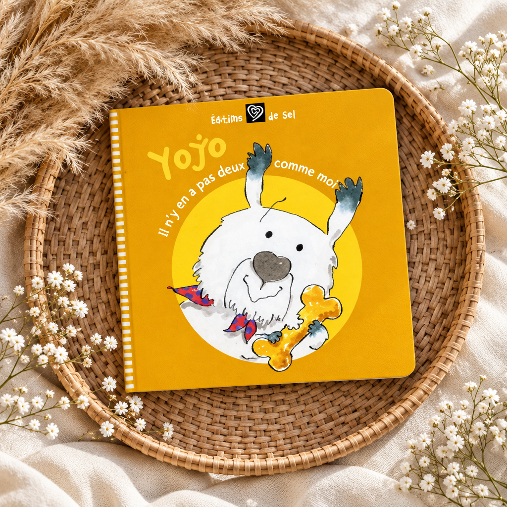 Livre à couverture jaune illustrée avec un chien blanc et le titre Yo-yo