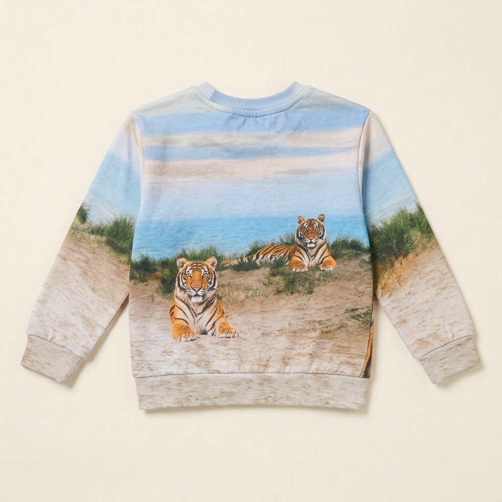 Chandail enfant H&M bleu clair, manches longues, motif tigres paysage.