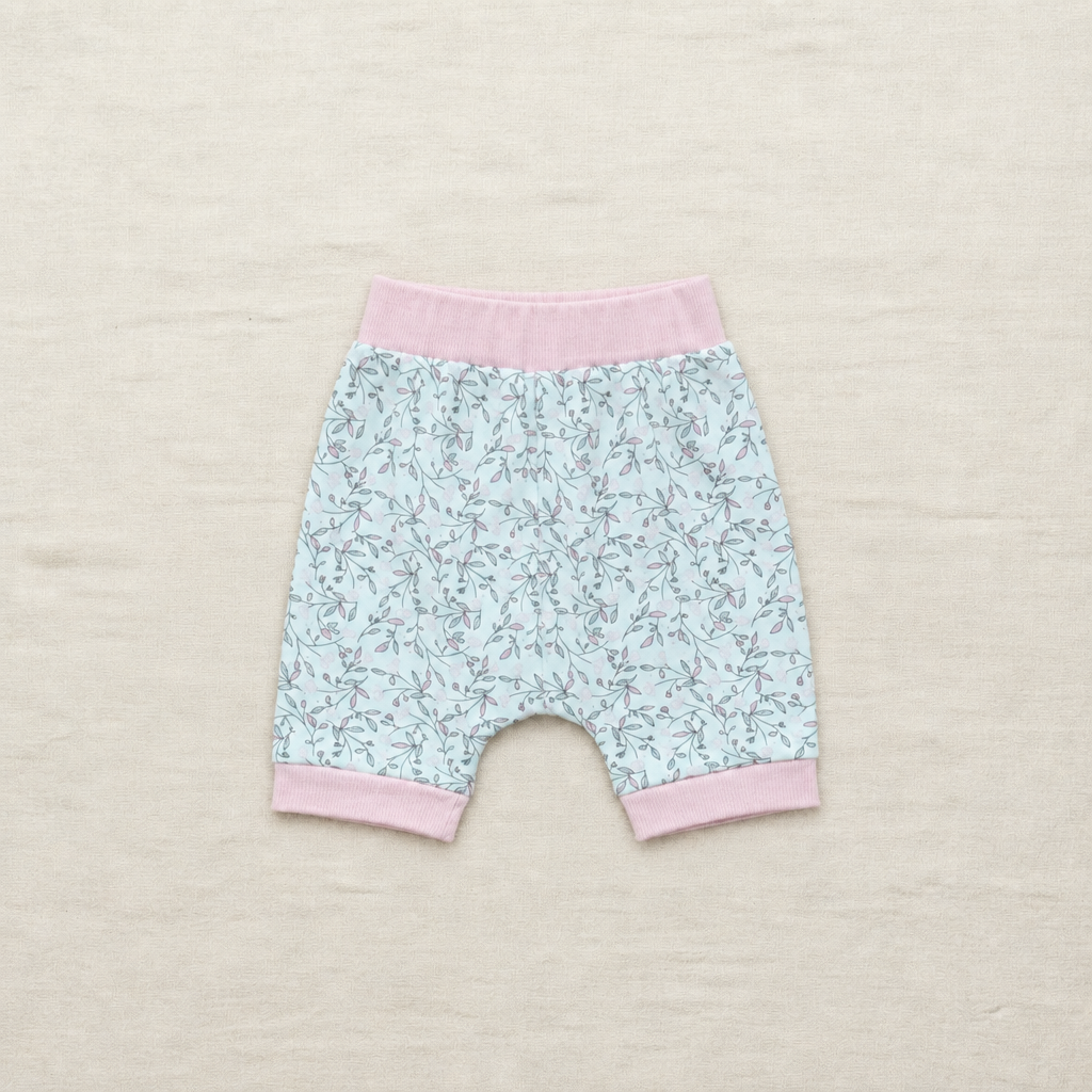 Short bébé 18 mois en coton, imprimé floral bleu et finitions roses à la taille