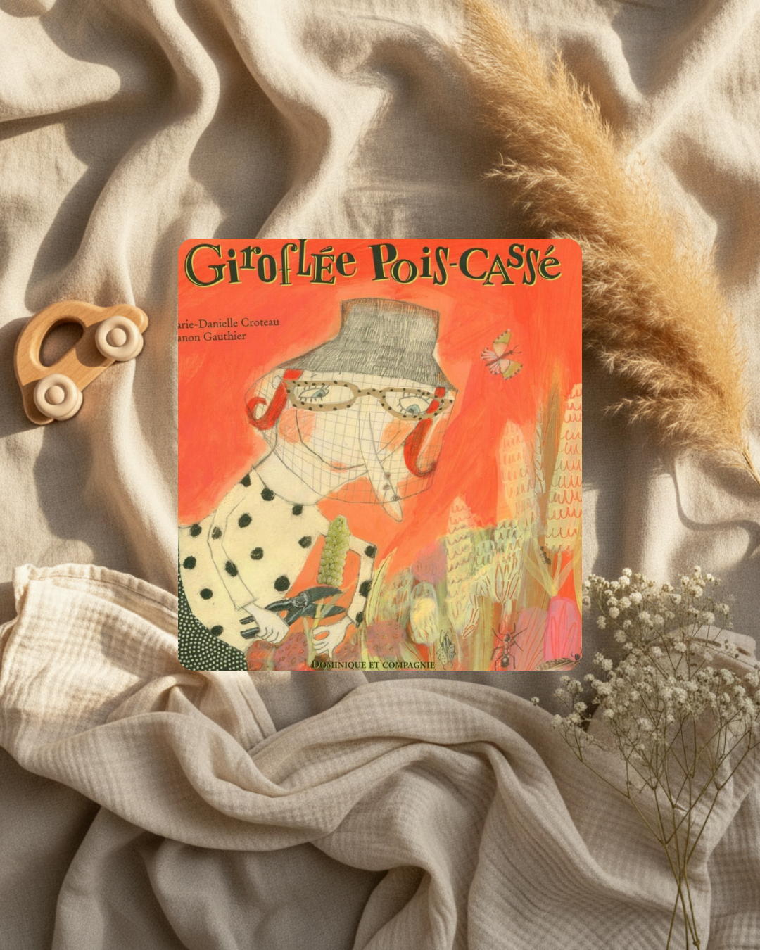 Livre enfant Giroflé Pois-Cassé à couverture illustrée, fond orange et motifs animaux