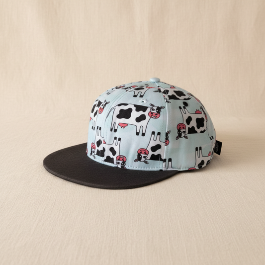 Casquette vaches - vue de côté fond lin